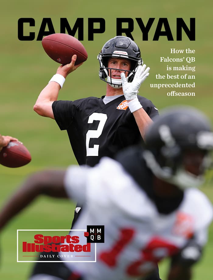 Matt Ryan throwing a football at an offseason camp.