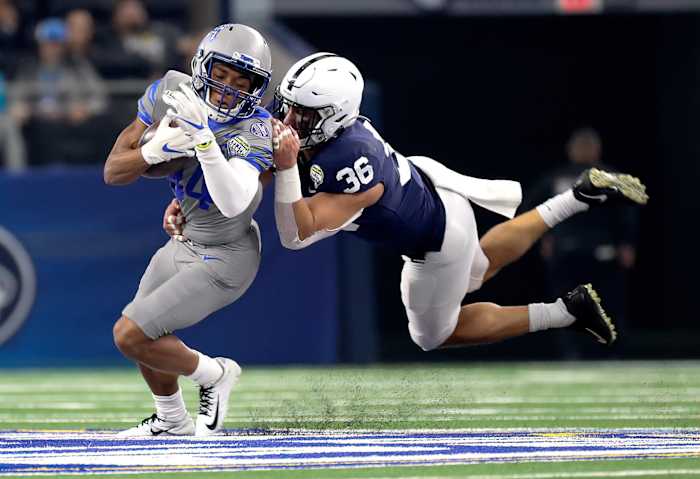 Former Penn State linebacker Jan Johnson makes a tackle at the Cotton Bowl.