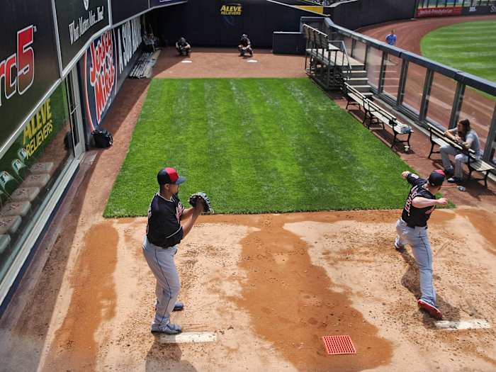 Two pitchers throw in the bullpen