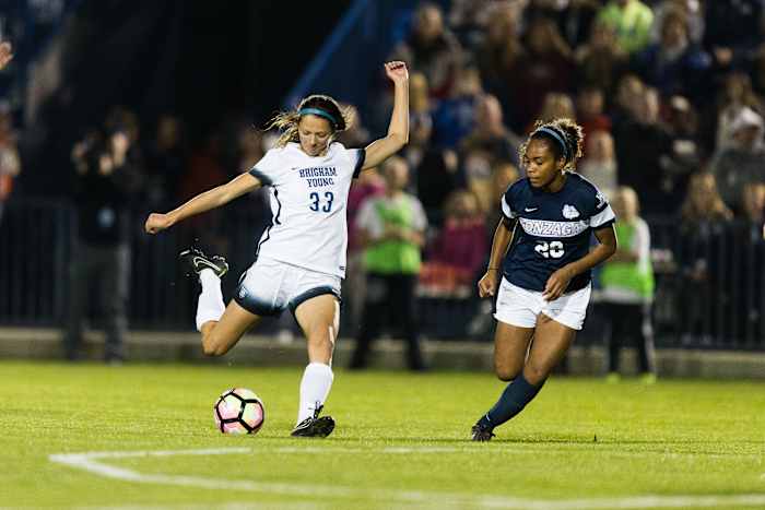 Ashley Hatch passes the ball against Ari Davis Gonzaga on Nov. 5, 2016. Credit: The Daily Universe 