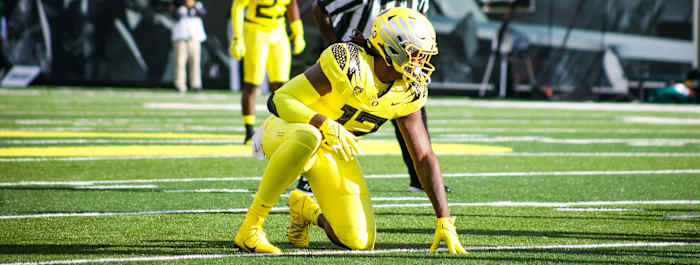 DJ Johnson (12) lines up at defensive end against Stony Brook.
