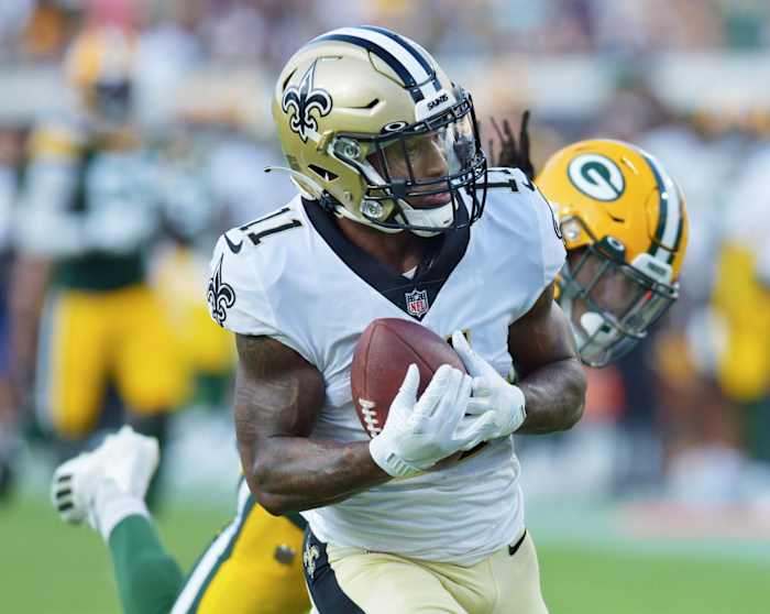 New Orleans Saints receiver Deonte Harris (11) pulls in a 55 yard touchdown pass from quarterback Jameis Winston (2) against the Packers. © Bob Self/Florida Times-Union via Imagn Content Services, LLC