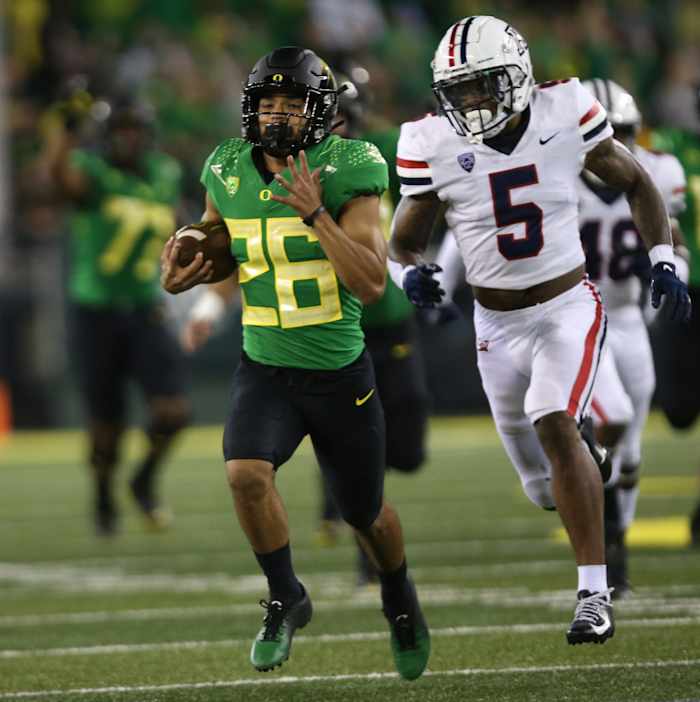Dye runs for a big gain against Arizona.