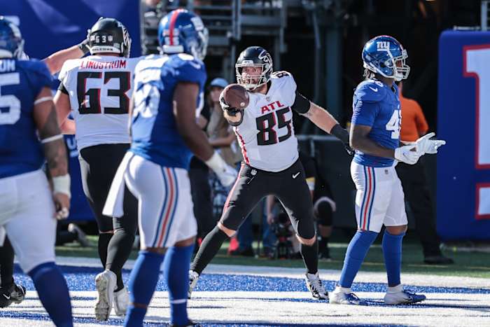 Sep 26, 2021; East Rutherford, New Jersey, USA; Atlanta Falcons tight end Lee Smith (85) celebrates after scoring a touchdown with offensive guard Chris Lindstrom (63) against the New York Giants during the second half at MetLife Stadium.