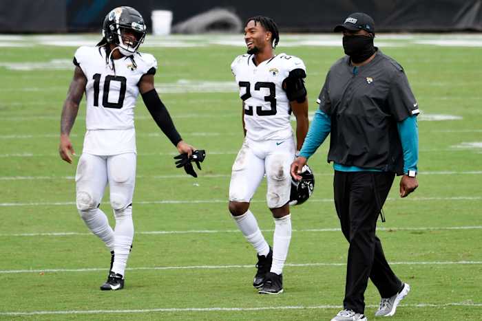 Henderson (23) walks off the field with teammate Laviska Shenault (10) after a game winning performance in his rookie debut versus the Indianapolis Colts. Mandatory Credit: Douglas DeFelice-USA TODAY Sports