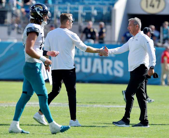 Trevor Lawrence (forefront) and Urban Meyer (right) can learn a lot from Kliff Kingsbury (left) and Kyler Murray. [Bob Self/Florida Times-Union]