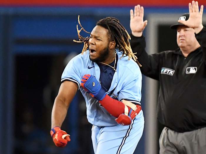 Sep 29, 2021; Toronto, Ontario, CAN; Toronto Blue Jays first baseman Vladimir Guererro Jr. (27) reacts after hitting an RBI double against New York Yankees in the fifth inning at Rogers Centre.