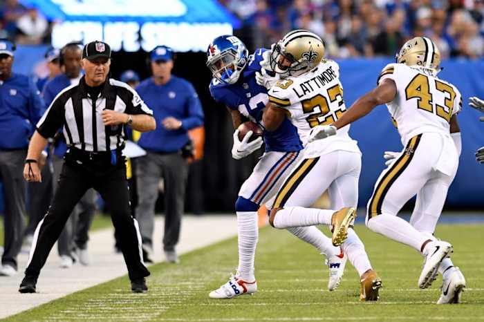 New York Giants wide receiver Odell Beckham Jr. (13) is covered by New Orleans Saints cornerback Marshon Lattimore (23). © Danielle Parhizkaran/NorthJersey.com