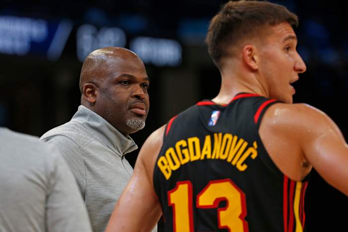 Nate McMillan speaks with Bogdan Bogdanovic.