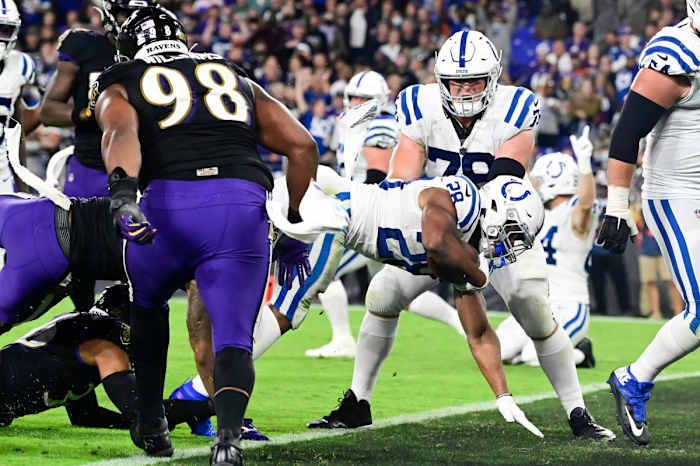 Oct 11, 2021; Baltimore, Maryland, USA; Indianapolis Colts running back Jonathan Taylor (28) dives for a third quarter touchdown against the Baltimore Ravens at M&T Bank Stadium.