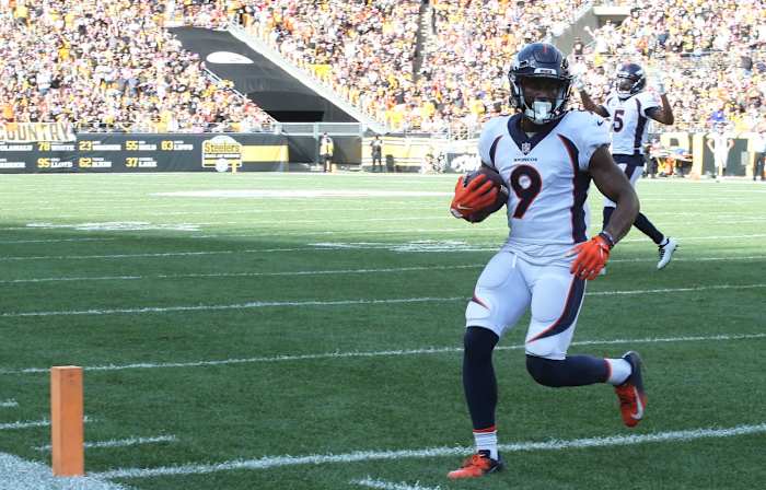 Denver Broncos wide receiver Kendall Hinton (9) scores a touchdown on a two yard pass against the Pittsburgh Steelers during the fourth quarter at Heinz Field. The Steelers won 27-19.