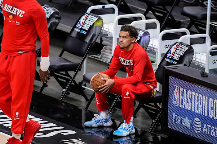 Atlanta, Georgia, USA; Atlanta Hawks guard Trae Young (11) sits on the bench prior to the game against the Milwaukee Bucks during game three of the Eastern Conference Finals for the 2021 NBA Playoffs at State Farm Arena.