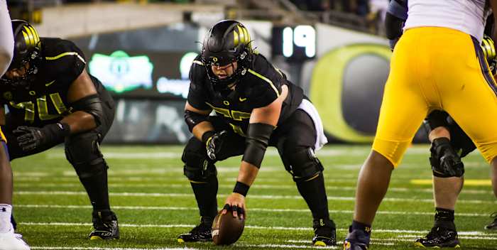 Ryan Walk prepares to snap the ball against the California Golden Bears.
