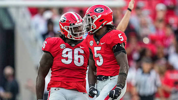Georgia football's defense celebrates a stop vs Kentucky
