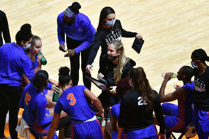 Gators assistant head coach Kelly Rae Finley addresses Florida's women's basketball team in 2021.