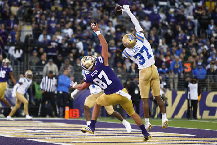 A pass for Cade Otton in the end zone is knocked away.