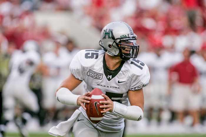 Brennan's Hawaii totals: 14,193 passing yards, with 131 TDs.