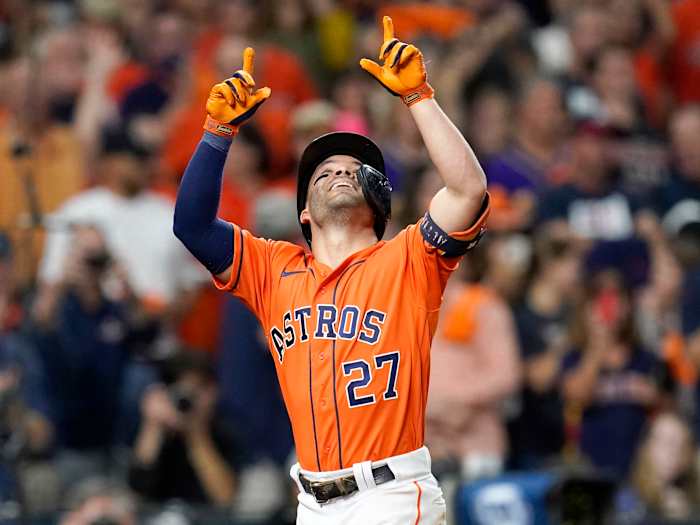 Oct 27, 2021; Houston, TX, USA; Houston Astros second baseman Jose Altuve (27) celebrates after hitting a solo home run against the Atlanta Braves during the seventh inning in game two of the 2021 World Series at Minute Maid Park.
