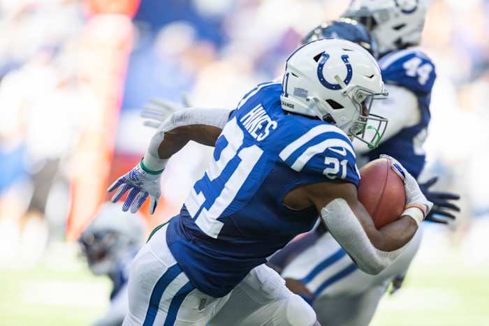 Oct 17, 2021; Indianapolis, Indiana, USA; Indianapolis Colts running back Nyheim Hines (21) runs the ball in the first quarter against the Houston Texans at Lucas Oil Stadium.