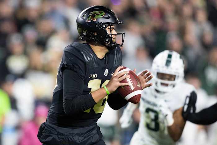 Nov 6, 2021; West Lafayette, Indiana, USA; Purdue Boilermakers quarterback Aidan O'Connell (16) drops back to pass the ball in the second half against the Michigan State Spartans at Ross-Ade Stadium.