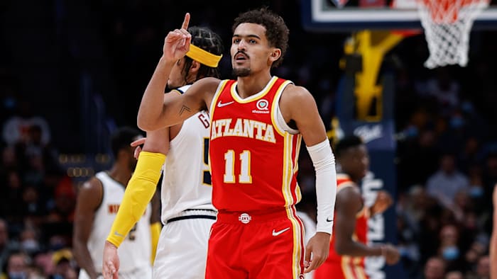 Atlanta Hawks guard Trae Young (11) reacts after a play in the second quarter against the Denver Nuggets.