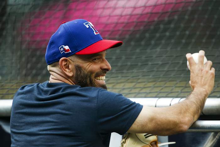 Jul 2, 2021; Seattle, Washington, USA; Texas Rangers manager Chris Woodward (8) talks with players during batting practice before a game against the Seattle Mariners at T-Mobile Park. Mandatory Credit: Joe Nicholson-USA TODAY Sports