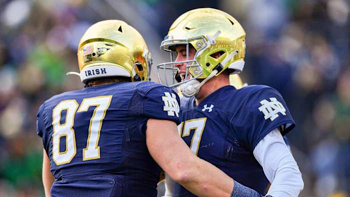 Notre Dame's Michael Mayer and Jack Coan celebrate a TD