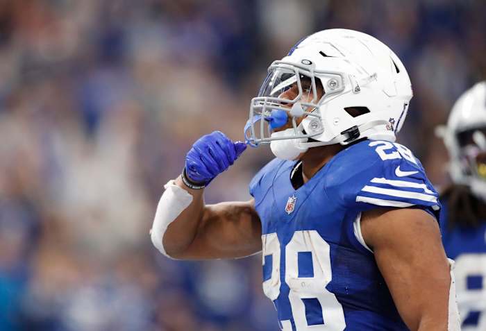 Indianapolis Colts running back Jonathan Taylor (28) celebrates after a fourth quarter touchdown Sunday, Nov. 28, 2021, during a game against the Tampa Bay Buccaneers at Lucas Oil Stadium in Indianapolis.