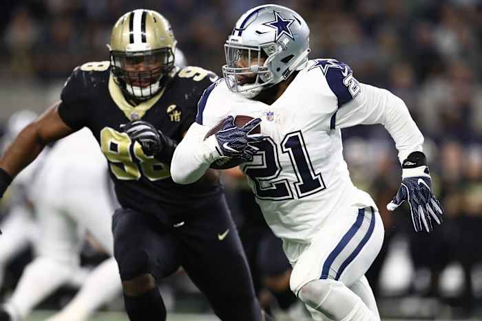 Dallas Cowboys running back Ezekiel Elliott (21) runs the ball against New Orleans. Mandatory Credit: Matthew Emmons-USA TODAY Sports