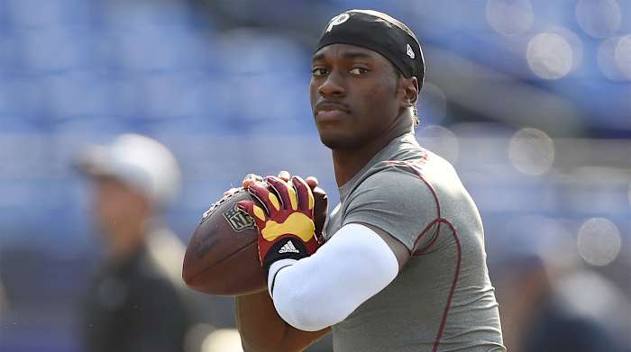 Aug 29, 2015; Baltimore, MD, USA; Washington Redskins quarterback Robert Griffin III (10) looks to throw before the game against the Baltimore Ravens at M&T Bank Stadium.