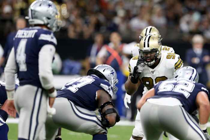 Dallas Cowboys quarterback Dak Prescott (4) looks over the New Orleans defense. Mandatory Credit: Chuck Cook-USA TODAY