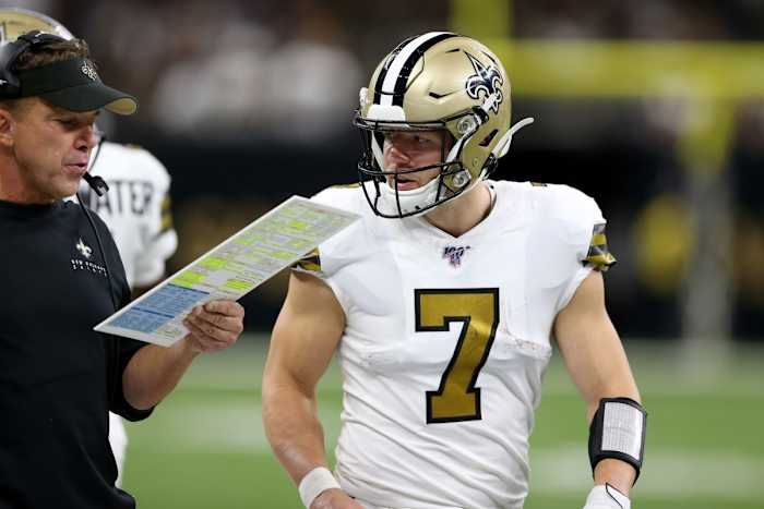 New Orleans Saints quarterback Taysom Hill (7) talks to head coach Sean Payton against the Dallas Cowboys. Mandatory Credit: Chuck Cook-USA TODAY Sports