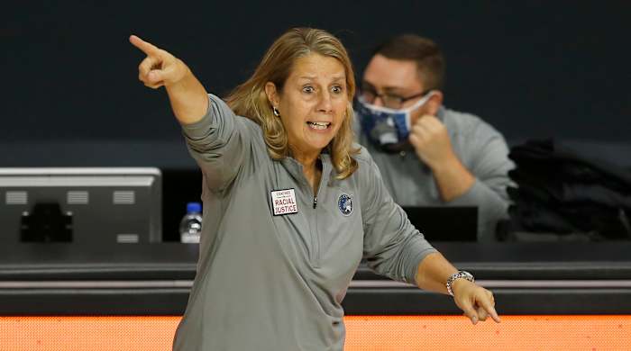Cheryl Reeve coaches a game.