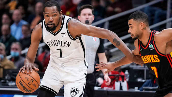 Brooklyn Nets forward Kevin Durant dribbles against Atlanta Hawks guard Timothe Luwawu-Cabarrot.