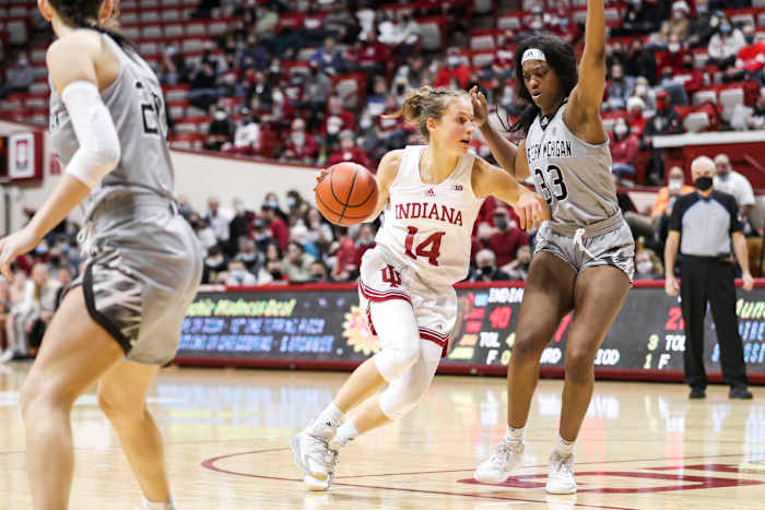 Ali Patberg dribbles around a Western Michigan defender.