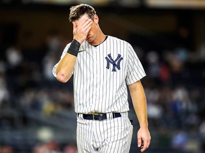 Sep 8, 2021; Bronx, New York, USA; New York Yankees second baseman DJ LeMahieu (26) wipes his face after the Yankees fail to score in the eighth inning against the Toronto Blue Jays at Yankee Stadium.