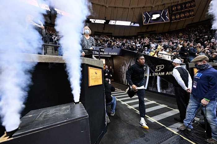 Jaden Ivey runs through the Purdue tunnel before the Nicholls State game.