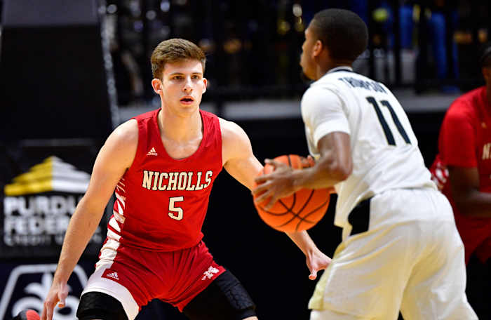 Isaiah Thompson looks for a way past a Nicholls State defender.