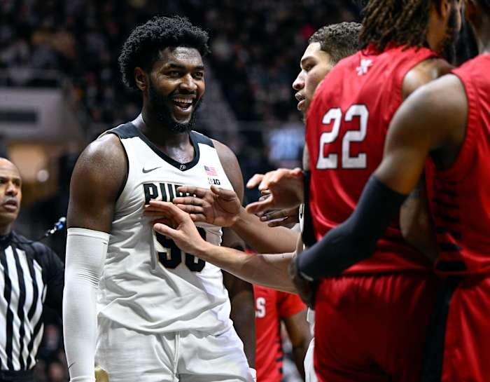 Trevion Williams reacts after blocking a basket.