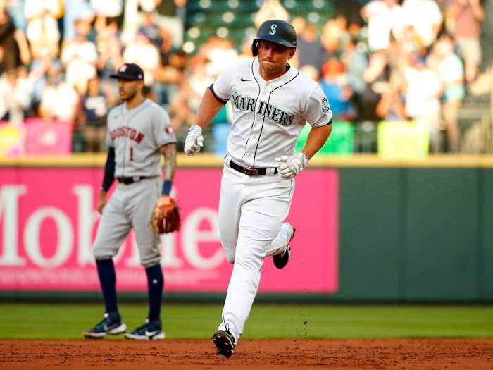 Jul 27, 2021; Seattle, Washington, USA; Seattle Mariners third baseman Kyle Seager (15) runs the bases after hitting a two run home run against the Houston Astros during the first inning at T-Mobile Park.