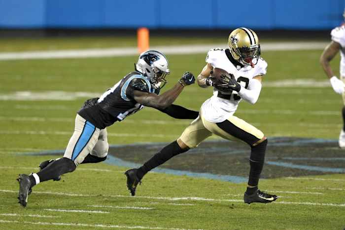 New Orleans Saints cornerback Marshon Lattimore (23) intercepts a pass against the Carolina Panthers. Mandatory Credit: Bob Donnan-USA TODAY Sports