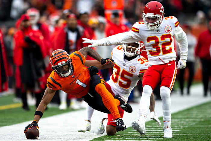 Cincinnati Bengals wide receiver Ja'Marr Chase (1) is forced out of bounds in the red zone by Kansas City Chiefs cornerback Charvarius Ward (35) as Kansas City Chiefs free safety Tyrann Mathieu (32) helps in the second half of the NFL game on Sunday, Jan. 2, 2022, at Paul Brown Stadium in Cincinnati. Cincinnati Bengals defeated Kansas City Chiefs 34-31. © Albert Cesare / The Enquirer / USA TODAY NETWORK