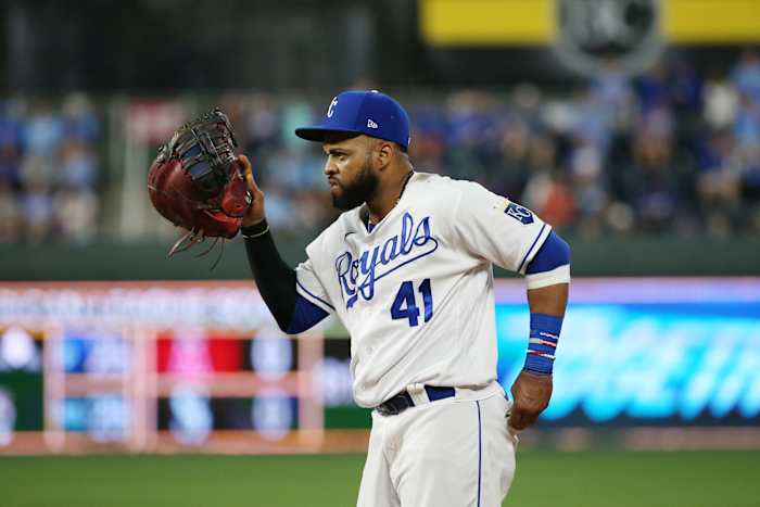 Oct 2, 2021; Kansas City, Missouri, USA; Kansas City Royals first baseman Carlos Santana (41) adjusting his equipment at Kauffman Stadium. Mandatory Credit: Gary Rohman-USA TODAY Sports