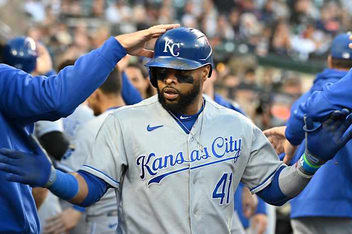 Sep 25, 2021; Detroit, Michigan, USA; Kansas City Royals first baseman Carlos Santana celebrates his fifth inning home run in the dugout in at Comerica Park. Mandatory Credit: Dale Young-USA TODAY Sports