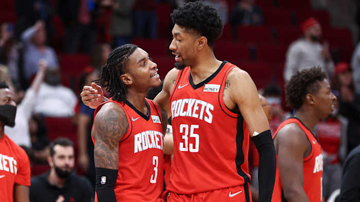 Houston Rockets guard Kevin Porter Jr. (3) and center Christian Wood (35) react after a play during overtime against the Charlotte Hornets.
