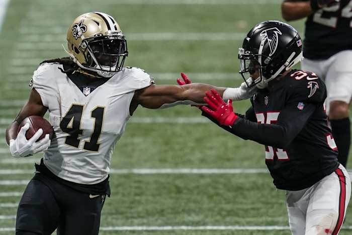 New Orleans Saints running back Alvin Kamara (41) fights off Atlanta safety Ricardo Allen (37) for extra yardage. Mandatory Credit: Dale Zanine-USA TODAY Sports