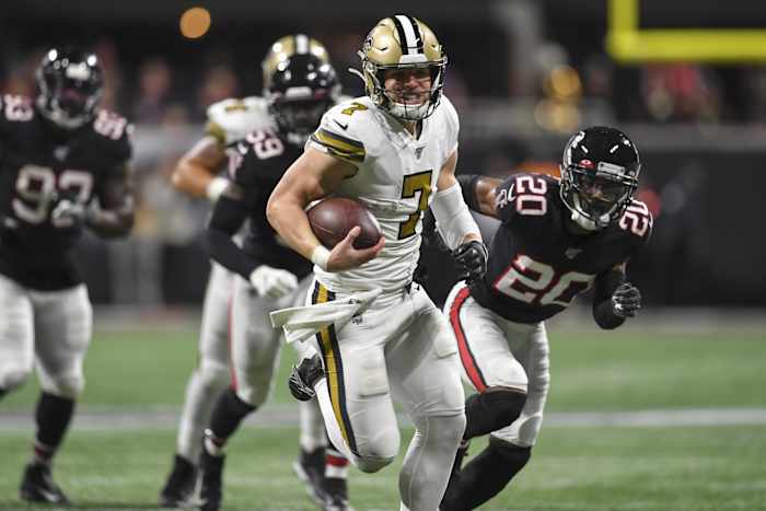 New Orleans Saints Taysom Hill (7) runs through the Falcons defense for a touchdown. Mandatory Credit: Dale Zanine-USA TODAY Sports