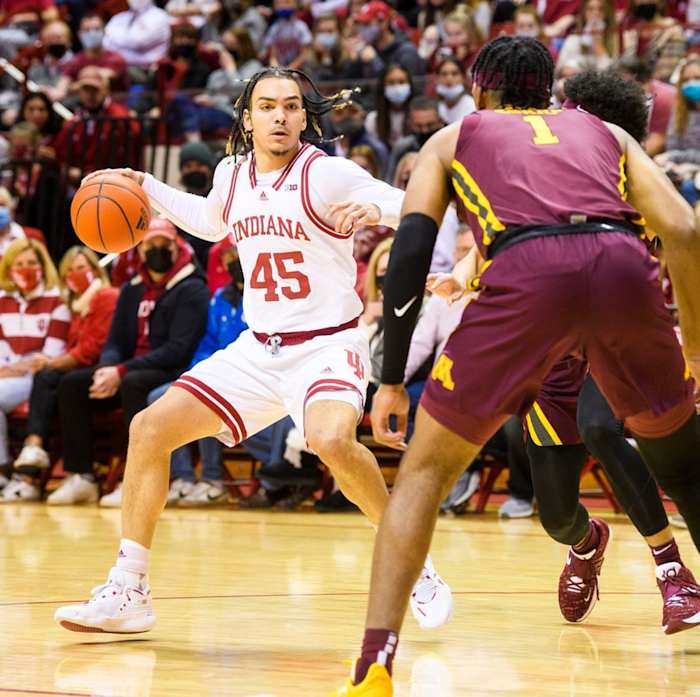 Indiana's Parker Stewart (45) looks for the open man against Minnesota. (Rich Janzaruk/USA TODAY Sports)