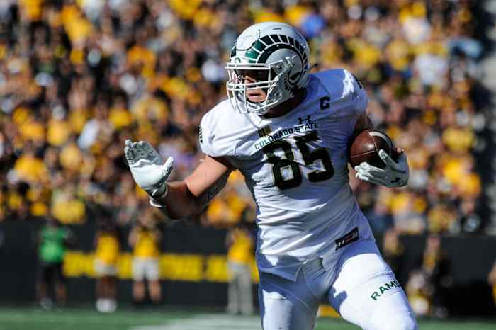 Colorado State tight end Trey McBride stiff arm