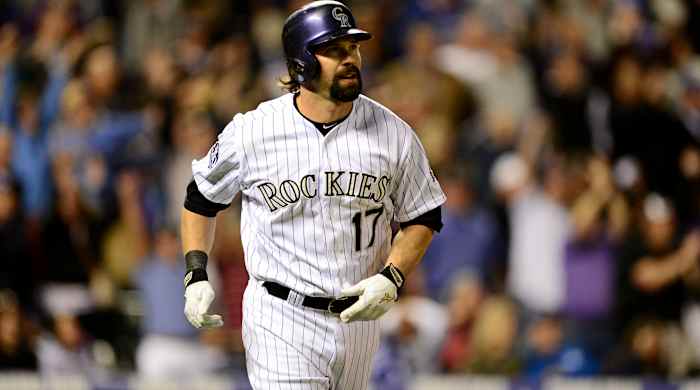 May 31, 2013; Denver, CO, USA; Colorado Rockies first baseman Todd Helton (17) reacts to his home run in the ninth inning against the Los Angeles Dodgers at Coors Field. The Dodgers defeated the Rockies 7-5 in ten innings.
